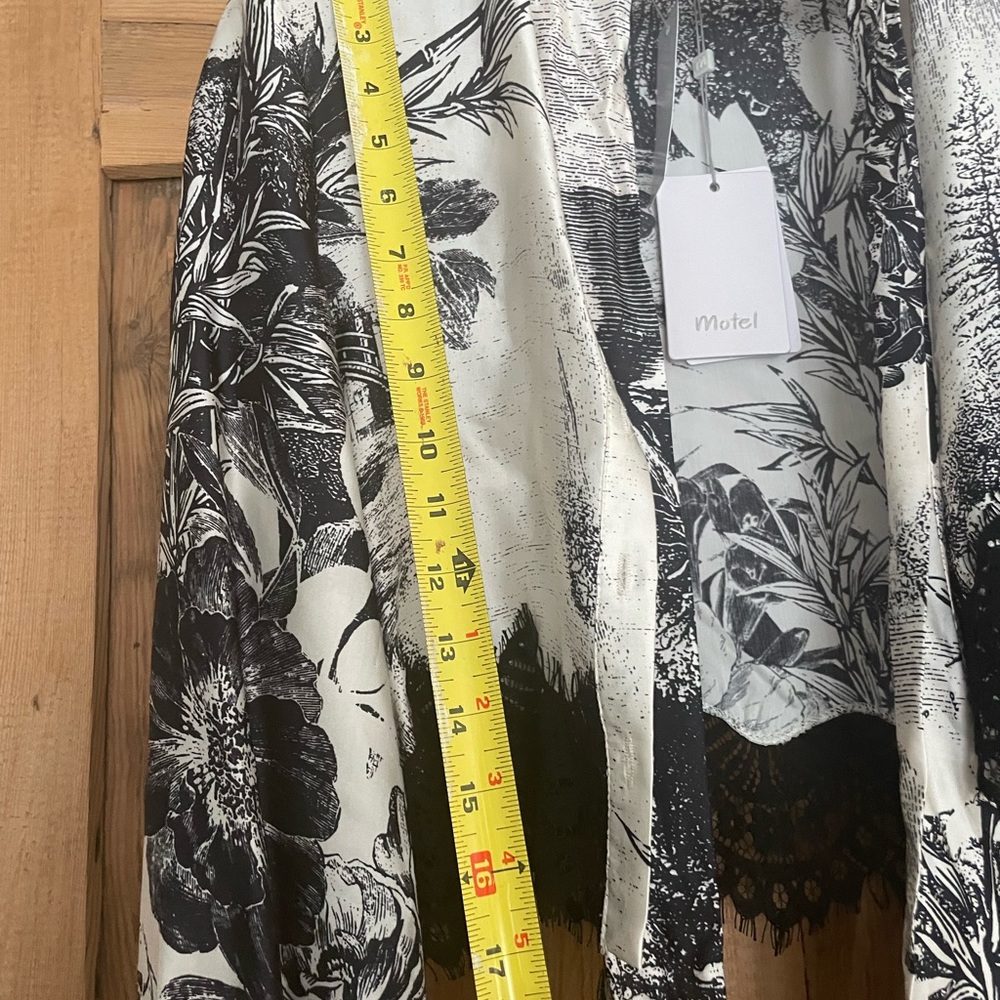 Woman Top Motel designer Top .Brand New with tags